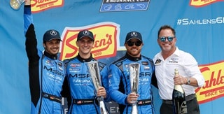 Acura Meyer Shank Racing #86 team take the podium Acura Meyer Shank Racing #86 team take the podium