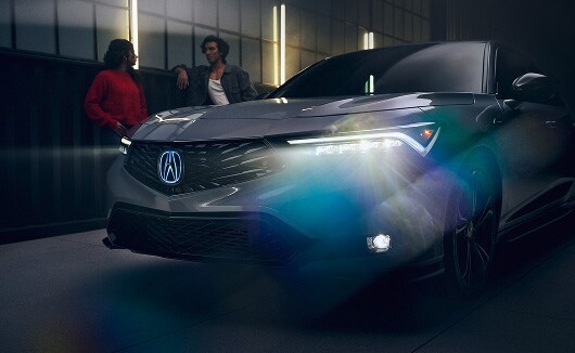 Acura Integra A-Spec with Technology Package in Urban Gray Pearl with Acura Genuine Accessory Illuminated Front Emblem. Acura Integra A-Spec with Technology Package in Urban Gray Pearl with Acura Genuine Accessory Illuminated Front Emblem.