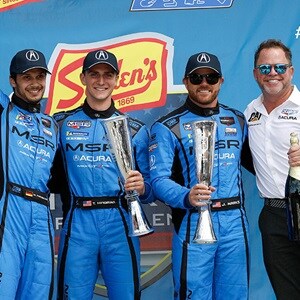 Acura Meyer Shank Racing #86 team take the podium Acura Meyer Shank Racing #86 team take the podium
