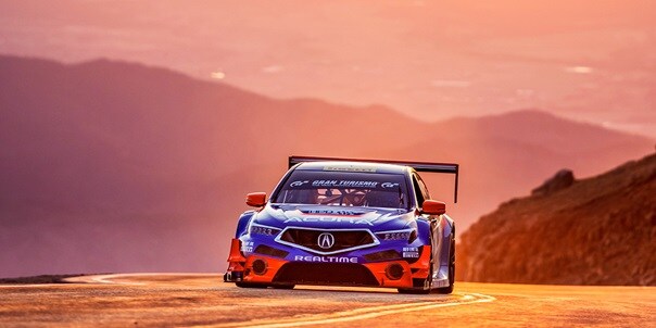 Acura RealTime Racing TLX GT at 2018 Pikes Peak with sunset background Acura RealTime Racing TLX GT at 2018 Pikes Peak with sunset background