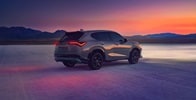 Acura 2025 ADX shown in Urban Gray Pearl premium paint and bold LED lighting emphasize the striking design of the ADX. Acura 2025 ADX shown in Urban Gray Pearl premium paint and bold LED lighting emphasize the striking design of the ADX.