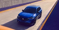 Acura 2025 ADX shown in Adriatic Sea Blue Metallic with Striking 19-in alloy wheels, illuminating LED fog lights and bold black exterior accents included in the A-Spec® Package add an athletic edge to the ADX. Acura 2025 ADX shown in Adriatic Sea Blue Metallic with Striking 19-in alloy wheels, illuminating LED fog lights and bold black exterior accents included in the A-Spec® Package add an athletic edge to the ADX.