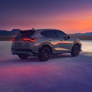 Acura 2025 ADX shown in Urban Gray Pearl premium paint and bold LED lighting emphasize the striking design of the ADX.