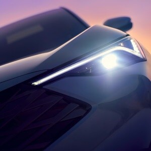 Acura 2025 ADX shown in Urban Gray Pearl with signature LED headlights and Chicane™ LED daytime running lights make a powerful first impression.  