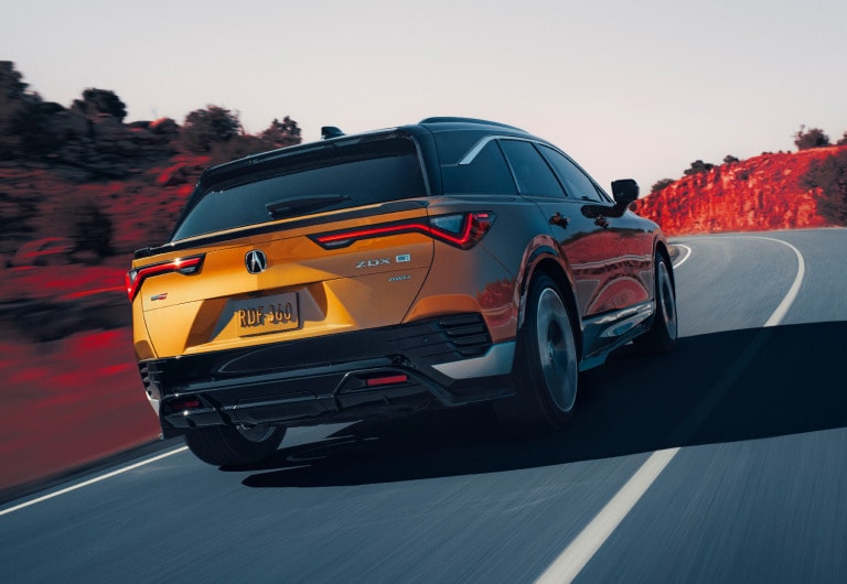 2024 Acura ZDX Type S in Tiger Eye Pearl on the road