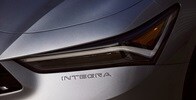 2023 Integra headlight with embossed badge detail 2023 Integra headlight with embossed badge detail