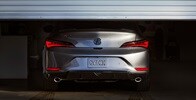 2023 Integra A-Spec in Liquid Carbon Metallic with accessories, rear view in a garage 2023 Integra A-Spec in Liquid Carbon Metallic with accessories, rear view in a garage