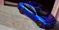 2023 Integra in Apex Blue Pearl top view in front of warehouse 2023 Integra in Apex Blue Pearl top view in front of warehouse