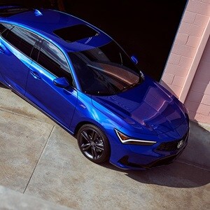 2023 Integra in Apex Blue Pearl top view in front of warehouse 2023 Integra in Apex Blue Pearl top view in front of warehouse