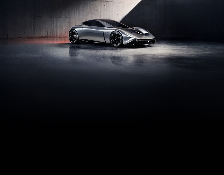 2026 Acura profile showcased in a dark minimalist studio with dramatic lighting.