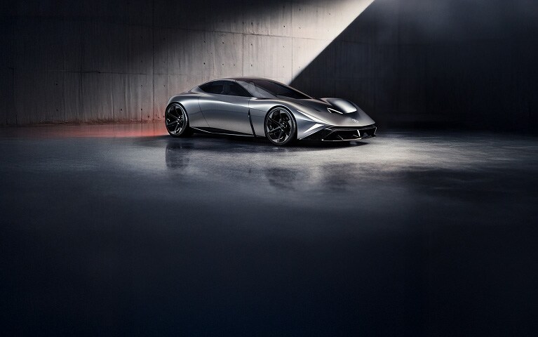 2026 Acura profile showcased in a dark minimalist studio with dramatic lighting.