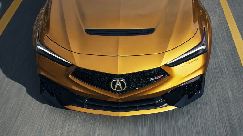 Acura Integra Type S in Tiger Eye Pearl arerial view of vented hood