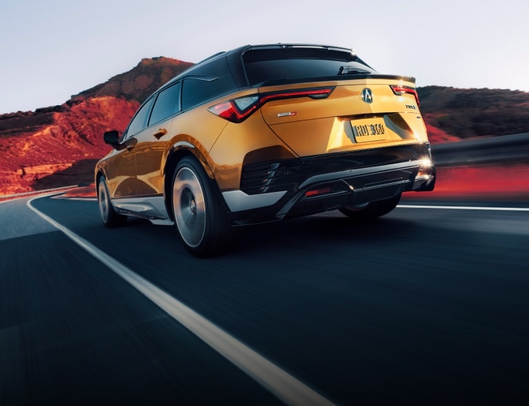 Acura 2024 ZDX in Tiger Eye Pearl rear 3/4 view