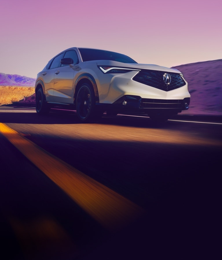 Acura 2025 ADX A-Spec in Platinum White Pearl on the road