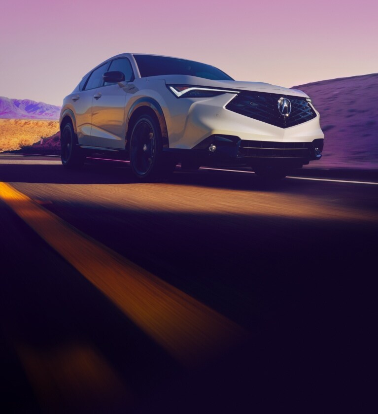 Acura 2025 ADX A-Spec in Platinum White Pearl on the road