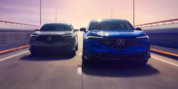 Two Acura 2025 ADX driving in a highway, front view Two Acura 2025 ADX driving in a highway, front view