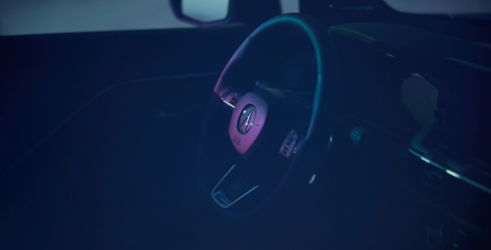 Acura ADX steering wheel and cabin