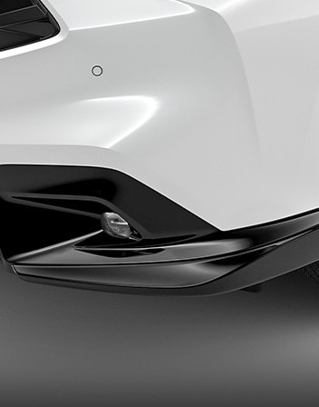 2026 Acura ADX shown in Platinum White Pearl featuring the Front Underbody Spoilers accessory.