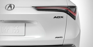 2026 Acura ADX shown in Platinum White Pearl featuring the Gloss Black Emblems accessories.