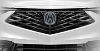 2026 Acura ADX shown in Platinum White Pearl featuring the Illuminated Front Emblem accessory.