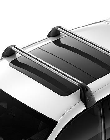 2026 Acura ADX shown in Platinum White Pearl featuring the Roof Rack accessory.