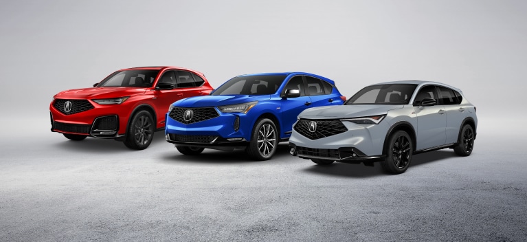 MDX in Performance Red Pearl, RDX in Apex Blue Pearl, and ADX in Urban Gray Pearl side by side.