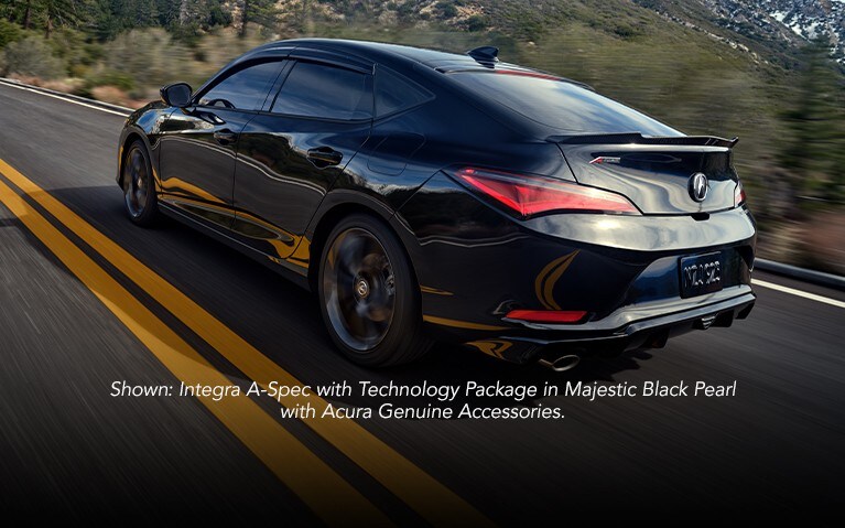 Acura Integra A-Spec with Tecnology package in Majestic Black Pearl driving shot 3/4 rear view