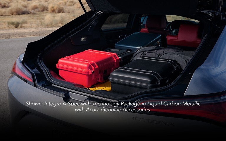 Acura Integra cargo space with suitcases