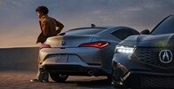 Two 2025 Integra in a roof top parkinglot one with rear view and the other with front view