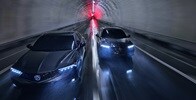 Two 2025 Integra driving in a tunnel, top front view