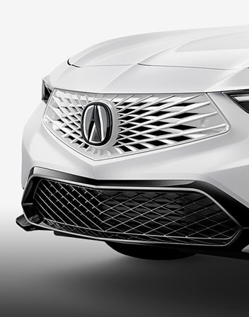 2026 Acura Integra shown in Platinum White Pearl featuring the Front Grille.