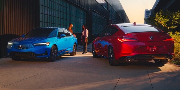 Two 2026 Acura Integra in a roof top parkinglot one with rear view and the other with front view. Two 2026 Acura Integra in a roof top parkinglot one with rear view and the other with front view.