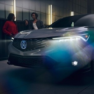 2026 Acura Integra in Urban Gray Pearl with Acura Genuine Accessory Illuminated Front Emblem. 2026 Acura Integra in Urban Gray Pearl with Acura Genuine Accessory Illuminated Front Emblem.