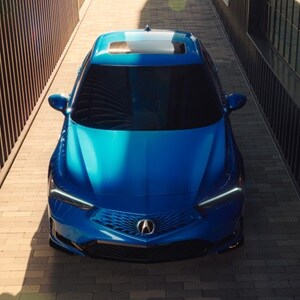 2026 Acura Integra front top view in Double Apex Blue Pearl. 2026 Acura Integra front top view in Double Apex Blue Pearl.