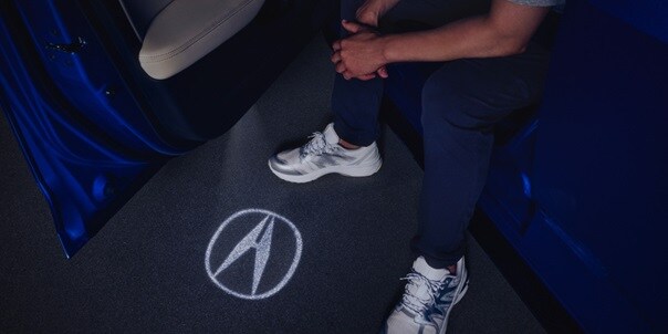 2026 Acura Integra with the Logo Pattern Projector detail. 2026 Acura Integra with the Logo Pattern Projector detail.