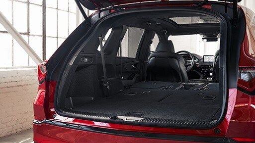 2024 MDX Type S Performance Red Pearl with Ebony interior cargo storage