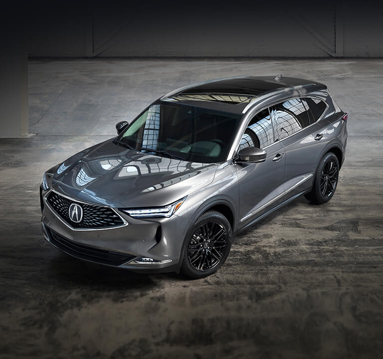 2024 Acura MDX Advance in Liquid Carbon Metallic in a warehouse
