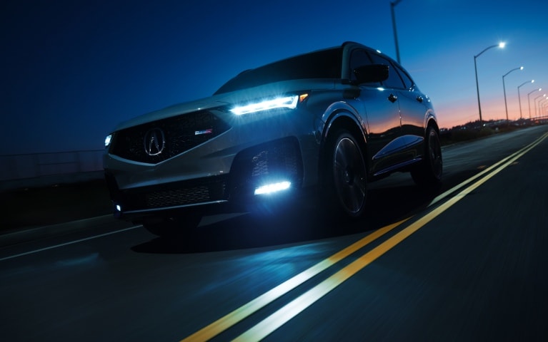 2026 Acura MDX Type S Advance driving on the highway at night