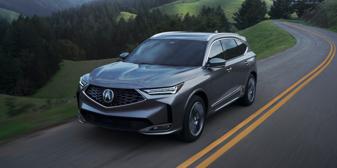 2026 Acura MDX in Liquid Carbon Metallic shown from a front three-quarter angle.