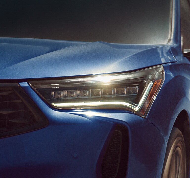 2023 RDX A-Spec in Apex Blue Pearl headlight close up