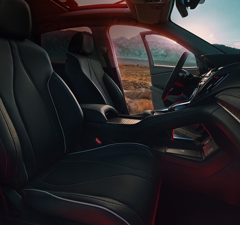 Acura 2023 RDX cabin ebony interior with ambient lighting