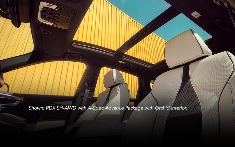 Acura 2024 RDX SH-AWD with A-Spec Advance Package with Orchid interior, showing panoramic moonroof.