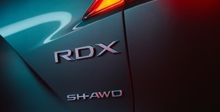 Acura 2025 RDX Super Handling All-Wheel Drive™ badge