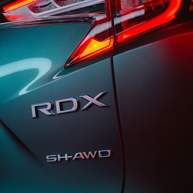 Acura 2026 RDX Super Handling All-Wheel Drive™ badge