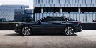 TLX 2022 Sleek and dynamic profile lines accentuate the muscular rear fenders TLX 2022 Sleek and dynamic profile lines accentuate the muscular rear fenders