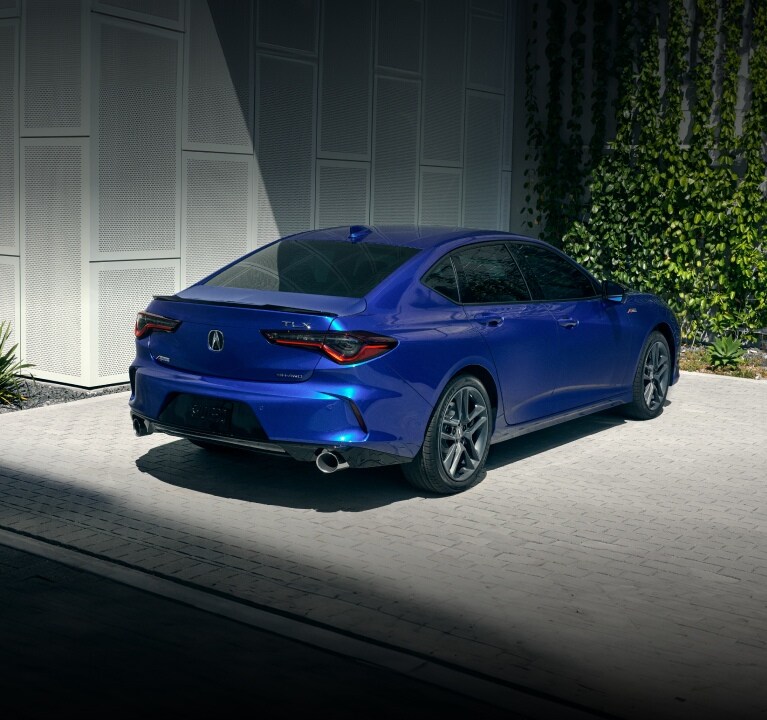 2025 Acura TLX A-Spec Package in Apex Blue Pearl 3/4 rear view.