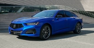 2025 Acura TLX A-Spec Package in Apex Blue Pearl with Shark Gray alloy wheels.