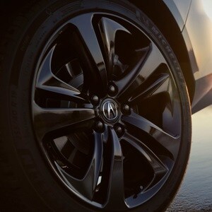 2025 Acura TLX Technology Package in Liquid Carbon Metallic with gloss black 20-inch alloy wheels.