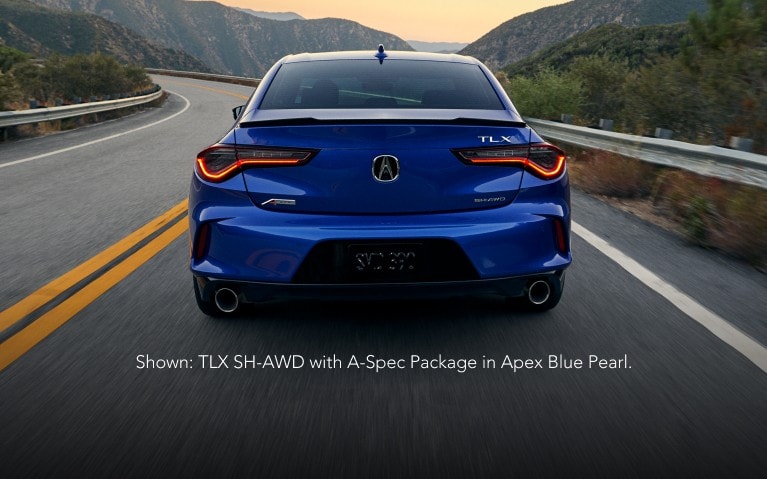 2025 Acura TLX A-Spec in Apex Blue Pearl on the road