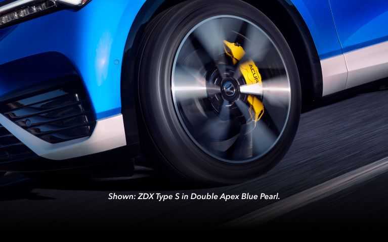 2024 Acura ZDX Type S in Double Apex Blue Pearl, detail of the front wheel in motion